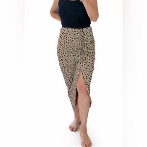 Miou Muse black polkadot, and tan side, rouch skirt. Medium .